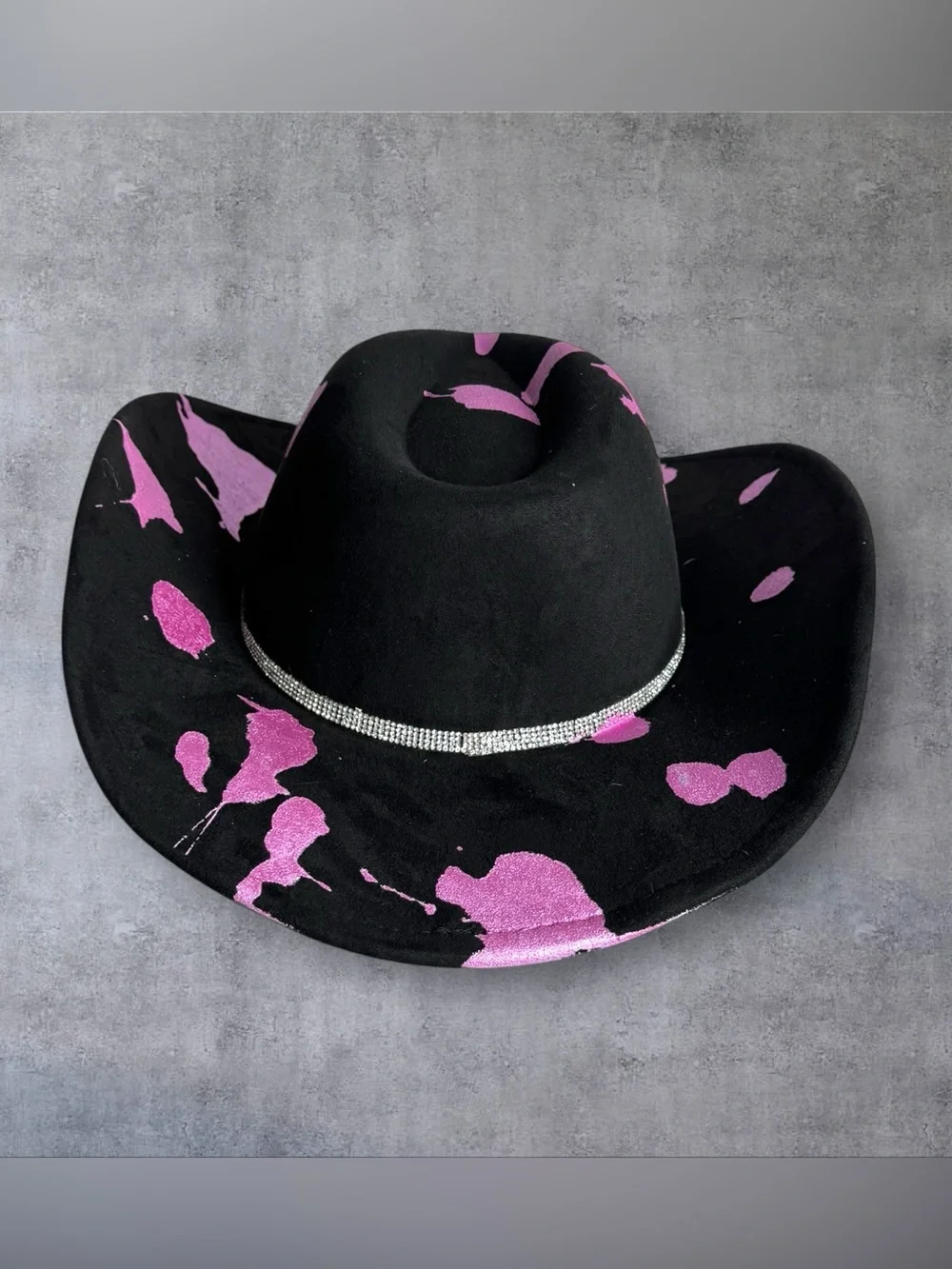 Black Cowboy Hat with Pink Accents and Star Embellishments